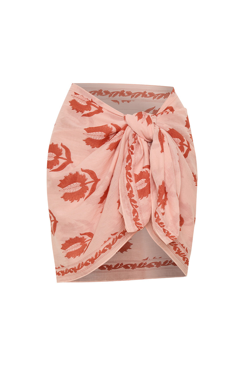 Ria Sarong Cherry Blossom — ghost mannequin front view tied at waist as mini wrap, cherry blossom pink hand block print cotton with coral lotus motifs, white background | Daughters of India
